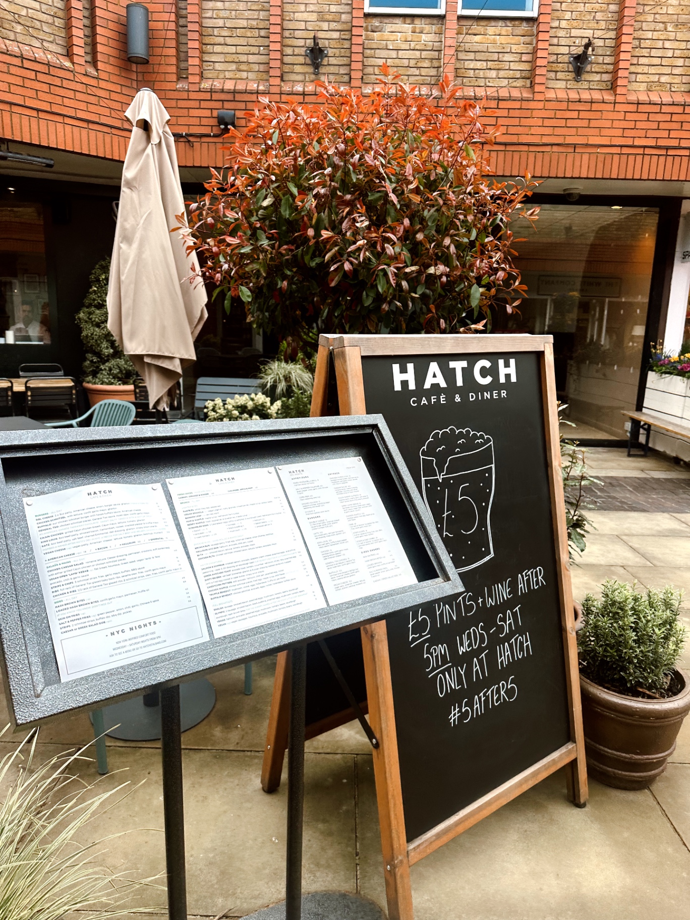 A takeaway coffee in the sun outside a London café