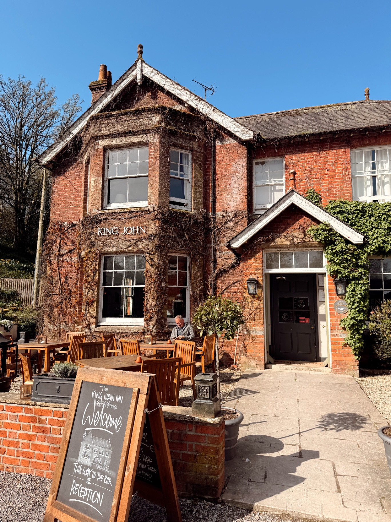 A quiet English village inn in golden afternoon light